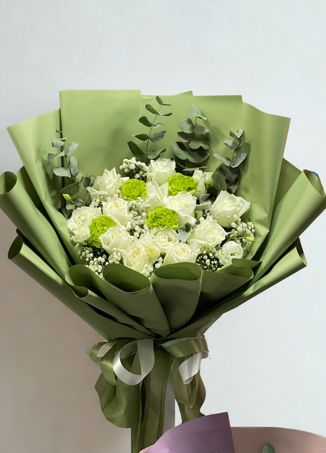 Natural white roses and green carnations bouquet with eucalyptus wrapped in sage green paper - fresh flower delivery Bangkok | DP FLOWERS BANGKOK
