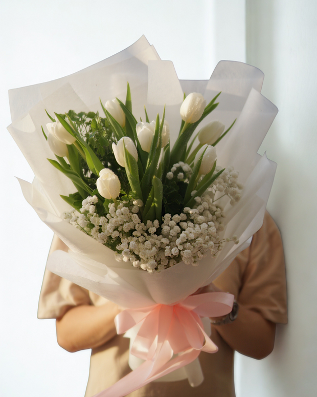 Elegant white tulip bouquet with 10 fresh stems, baby's breath and pink ribbon bow - fresh flower delivery Bangkok | DP FLOWERS BANGKOK