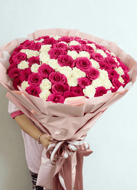 Luxury fuchsia and white roses bouquet wrapped in blush pink paper with satin ribbon - romantic flower delivery Bangkok | DP FLOWERS BANGKOK
