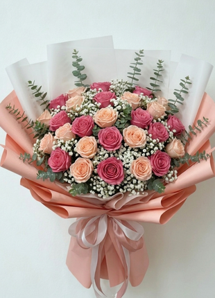 Elegant coral and pink roses bouquet with eucalyptus in white coral wrapping - fresh flower delivery Bangkok Deluxe Size | DP FLOWERS BANGKOK