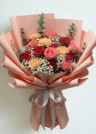 Vibrant coral pink roses and golden yellow carnations bouquet with burgundy carnations wrapped in dusty rose paper exra size - colorful flower delivery Bangkok | DP FLOWERS BANGKOK