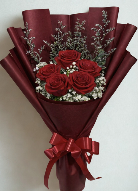 Five premium red roses bouquet with baby's breath and eucalyptus in deep red wrapping with silver band and red ribbon - Valentine's Day delivery Bangkok | DP FLOWERS BANGKOK