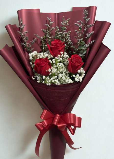 Three premium red roses bouquet with baby's breath and eucalyptus in deep red wrapping and red ribbon - Valentine's Day delivery Bangkok | DP FLOWERS BANGKOK