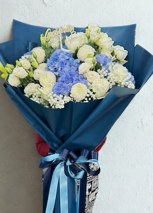 Blue hydrangea and white roses congratulations bouquet wrapped in ocean blue paper with ribbon - graduation flower delivery Bangkok | DP FLOWERS BANGKOK