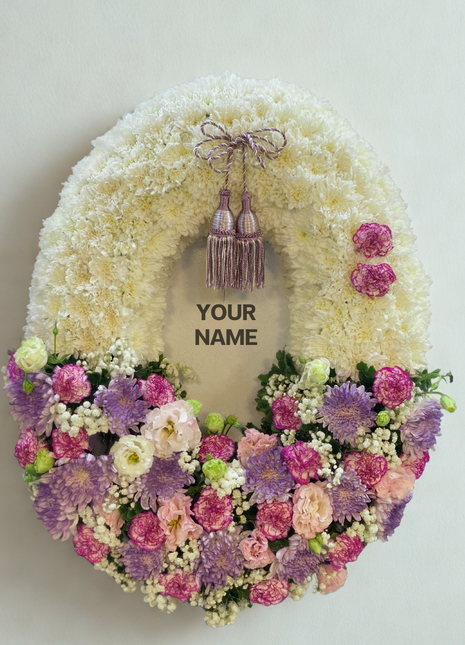 Elegant memorial wreath with purple chrysanthemums, pink carnations and white flowers with customizable ribbon - funeral flowers Bangkok | DP FLOWERS BANGKOK