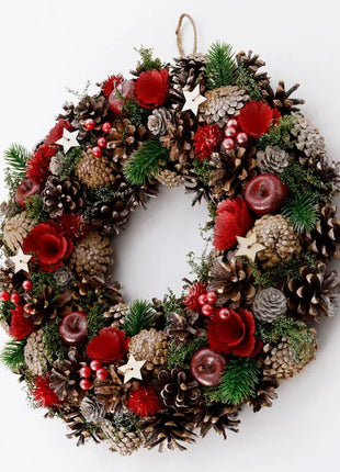 Luxurious large handcrafted Christmas wreath with abundant pine cones, red dried flowers, burgundy accents, evergreen sprigs and wooden stars with jute rope - grand holiday decoration Bangkok | DP FLOWERS BANGKOK