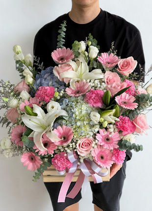 Grand luxury flower basket with white lilies, pink roses, gerberas, hydrangeas, and mixed premium flowers in wooden basket with ribbons - spectacular flower delivery Bangkok | DP FLOWERS BANGKOK