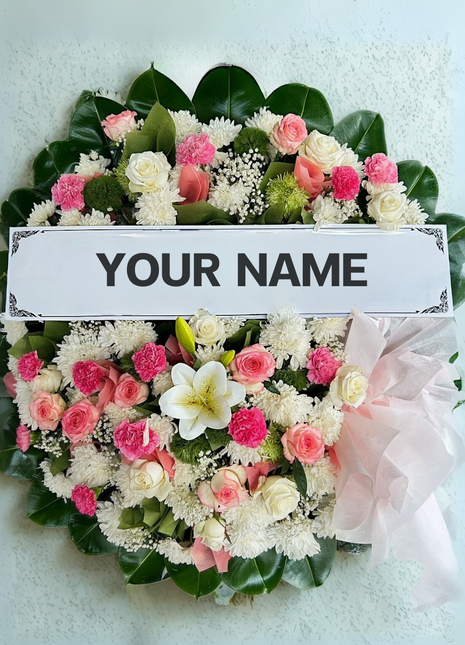 Elegant funeral wreath with pink roses, white chrysanthemums and personalized nameplate - sympathy flower delivery Bangkok | DP FLOWERS BANGKOK