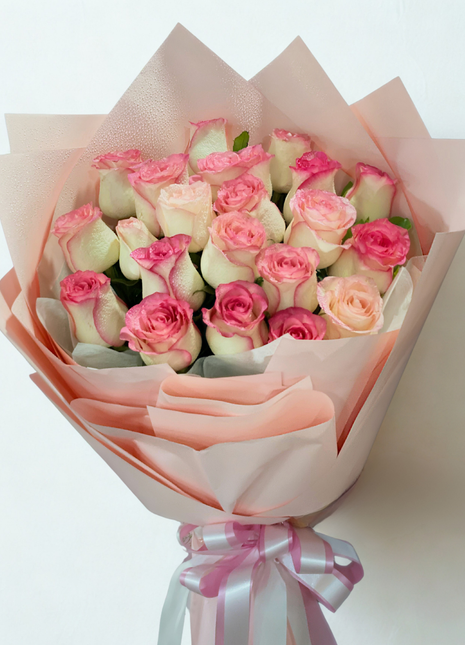 Sweet pink roses bouquet in multiple shades wrapped in gradient pink paper - feminine flower delivery Bangkok | DP FLOWERS BANGKOK