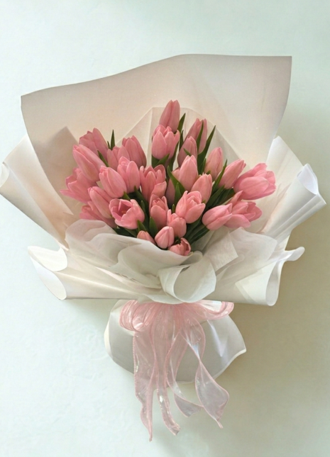 Grand bouquet of 30 premium soft pink tulips wrapped in white paper with pink organza ribbon - romantic flower delivery Bangkok | DP FLOWERS BANGKOK
