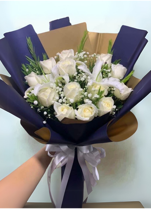 Luxury white roses bouquet with baby's breath wrapped in navy blue and gold paper with lavender ribbon - elegant flower delivery Bangkok | DP FLOWERS BANGKOK