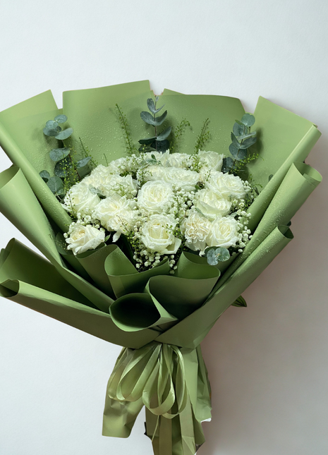 Pure white roses bouquet with eucalyptus and baby's breath in sage green wrapping - natural flower delivery Bangkok | DP FLOWERS BANGKOK