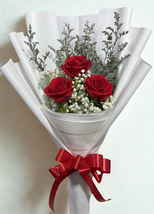 Three premium red roses bouquet with baby's breath and eucalyptus in white wrapping with silver band and red ribbon - Valentine's Day delivery Bangkok | DP FLOWERS BANGKOK