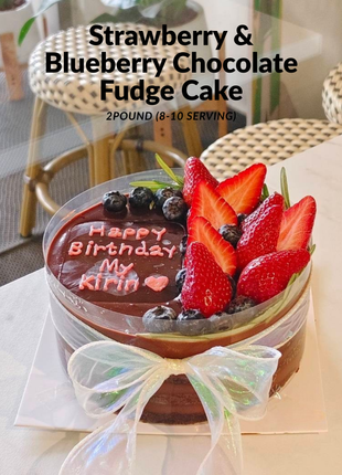 Fudge chocolate cake with fresh berries! Available in 2-4 pounds. Rich chocolate with strawberries & blueberries. Perfect gift. Order now!