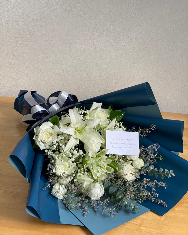 Happy woman holding a beautiful bouquet from DP FLOWERS BANGKOK – real customer review, surprised with flower delivery