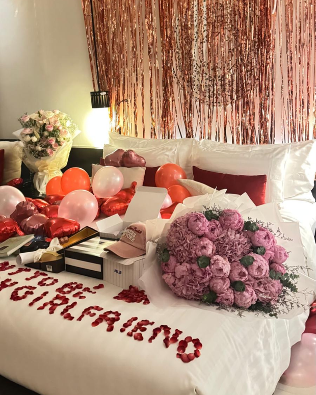 Happy man holding a beautiful bouquet from DP FLOWERS BANGKOK – real customer review, surprised with flower delivery